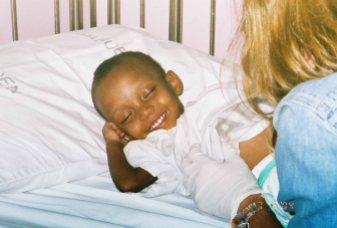 Sarah's first smile, at the hospital, 2004